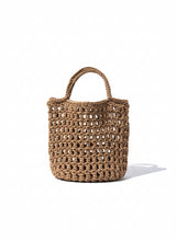 Load image into Gallery viewer, Brown woven handbag on a light background
