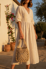 Load image into Gallery viewer, woman holding a Beige crochet raffia bag