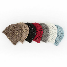 Load image into Gallery viewer, Stack of colorful sequin mesh summer hats on a white surface