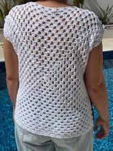 Load image into Gallery viewer, Person wearing a white crochet top with a blurred background