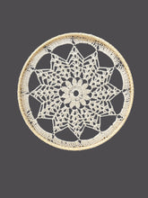 Load image into Gallery viewer, Crocheted doily on a gray background