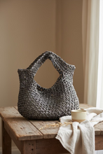 Load image into Gallery viewer, Crochet handbag on a table
