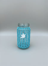 Load image into Gallery viewer, Glass jar covered by crochet cover turquoise and a white mother of pearl dove