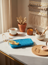 Load image into Gallery viewer, Cyan Crochet Wallet with Yellow Fish on Modern Desk