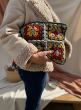 Load image into Gallery viewer, Granny squares clutch with enhanced background