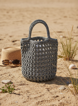 Load image into Gallery viewer, Gray and black net bag lifestyle background