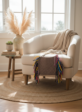 Load image into Gallery viewer, Lifestyle background with taupe crochet bag