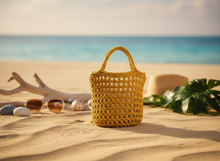 Load image into Gallery viewer, Mustard crochet net bag lifestyle background