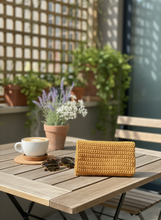 Load image into Gallery viewer, Mustard crochet wallet in lifestyle setting