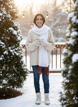 Load image into Gallery viewer, Teenager wearing white crochet winter scarf with multicolor fringe