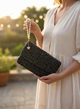 Load image into Gallery viewer, Woman holding Crochet Clutch