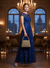 Load image into Gallery viewer, Woman holding evening gold crochet bag lifestyle shot