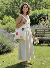 Load image into Gallery viewer, Young woman with crochet flower tote bag