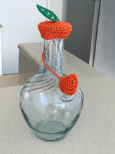 Load image into Gallery viewer, Orange ibriq cover with a green leaf