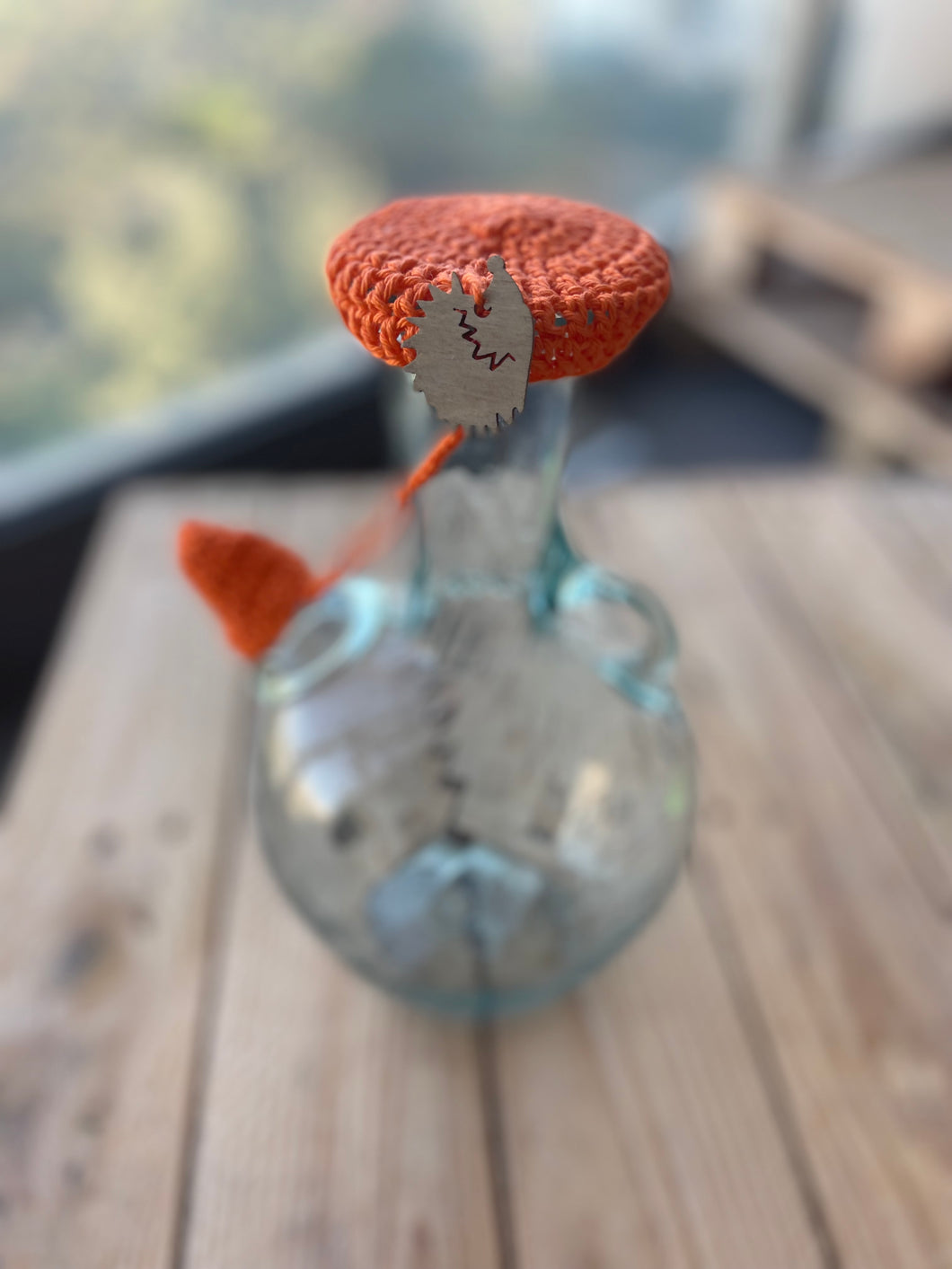 Orange crochet ibriq cover hedgehog