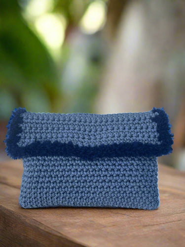 gray knitted bag with blue wool border