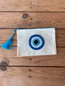 White Canva Pouches with a Cotton Crochet Evil Eye Applique and a Tassel