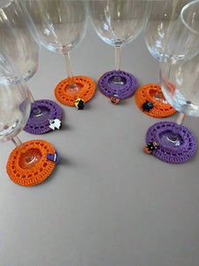 Spooky Halloween crochet wine coasters with a glass marker 