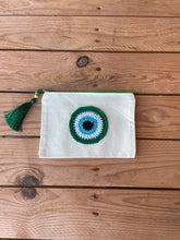 Load image into Gallery viewer, White Canva Pouches with a Cotton Crochet Evil Eye Applique and a Tassel
