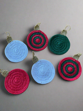 Load image into Gallery viewer, Red green white gold Christmas crochet coasters 
