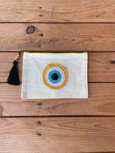 Load image into Gallery viewer, White Canva Pouches with a Cotton Crochet Evil Eye Applique and a Tassel
