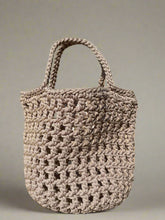 Load image into Gallery viewer, Beige crochet bag against a light background
