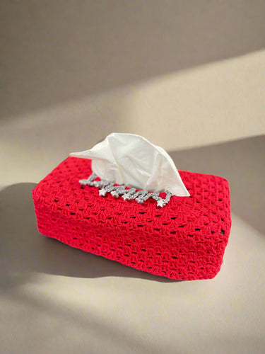 knitted red tissue box cover with stars for christmas