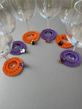 Load image into Gallery viewer, Spooky Halloween crochet wine coasters with a glass marker 
