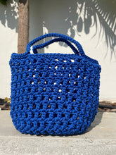 Load image into Gallery viewer, Blue woven bag against a light background
