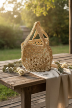 Load image into Gallery viewer, Crocheted Beige Bag on a table 
