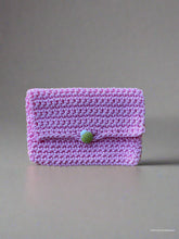 Load image into Gallery viewer, Pink knitted pouch with a green lady bug button
