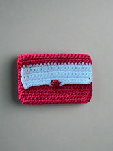 Load image into Gallery viewer, Red and white crocheted pouch with a ladybug button
