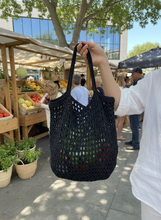 Load image into Gallery viewer, Black Polyester Crochet Net Bag Lifestyle - Handmade Urban Tote | CKKoetter
