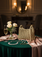 Load image into Gallery viewer, Elegant lifestyle background with evening gold crochet bag
