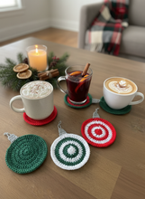 Load image into Gallery viewer, Festive holiday scene with crochet coasters and drinks
