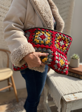 Load image into Gallery viewer, Granny squares clutch with enhanced background
