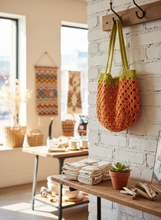 Load image into Gallery viewer, Granny squares cotton bag displayed in boutique shop
