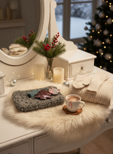 Load image into Gallery viewer, Gray winter crochet clutch in lifestyle setting
