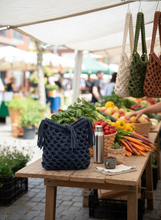 Load image into Gallery viewer, Lifestyle background for Blue Crochet Lycra Net Bag
