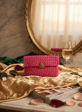 Load image into Gallery viewer, Lifestyle background for Pink Polyester Crochet Clutch

