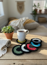 Load image into Gallery viewer, Lifestyle background with crochet coasters
