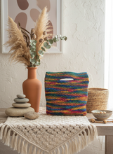 Load image into Gallery viewer, Lifestyle background with multicolored crochet bag
