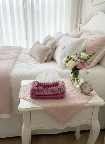 Pink Gray Striped Crochet Tissue Box Cover on Bedside Table