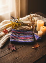 Load image into Gallery viewer, Purple Beige Brown Red Winter Crochet Clutch Lifestyle Photo
