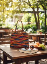 Load image into Gallery viewer, Striped crochet shoulder bag in casual lifestyle setting
