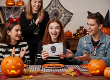 Load image into Gallery viewer, Teenagers receiving skull wallet as Halloween gift
