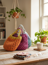 Load image into Gallery viewer, Three granny squares cotton bags on table
