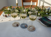 Load image into Gallery viewer, Three Wine Glass Coasters with Deer Charms Christmas Lifestyle

