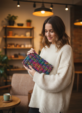 Load image into Gallery viewer, Winter Crochet Clutch Lifestyle - In Hand
