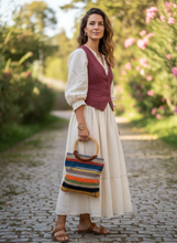 Load image into Gallery viewer, Woman holding crochet bag with burgundy linen and wooden handles
